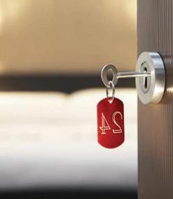 Room key inserted into door lock
